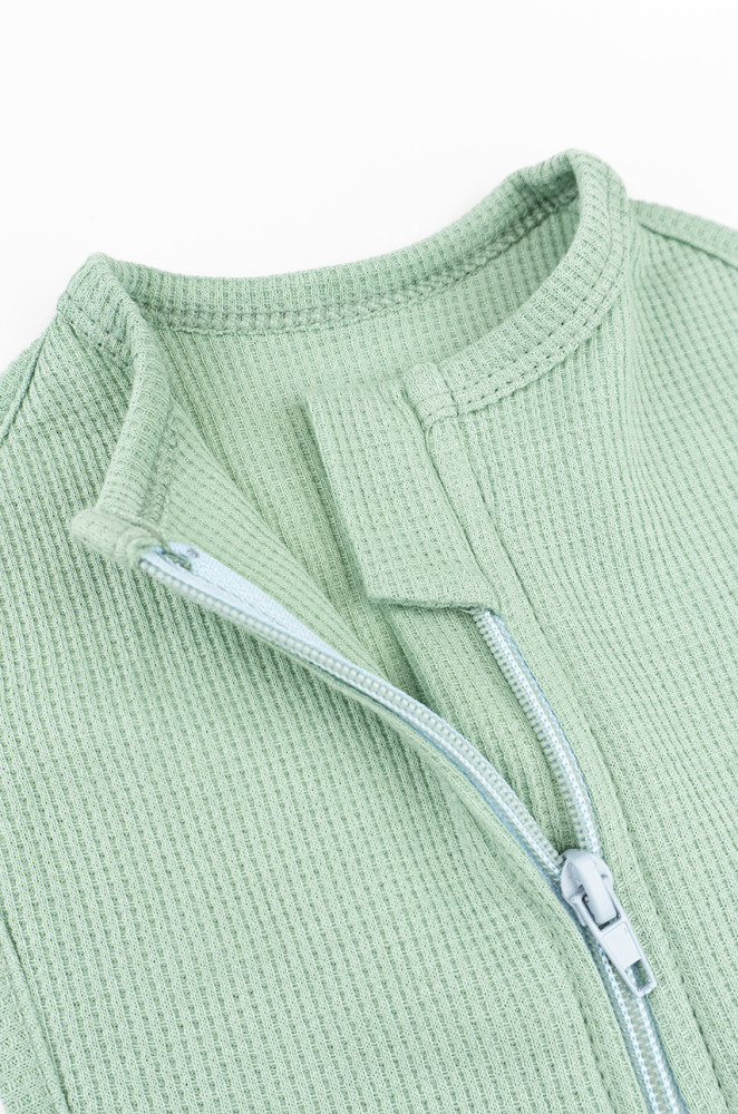 Кокон для немовля з блискавкою з однотонного фактурного трикотажу