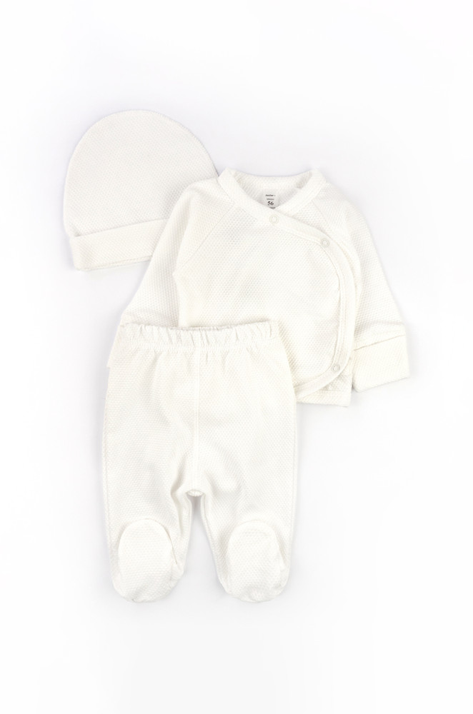 Newborn outfit: cotton gown, footed pants, and hat for the first days