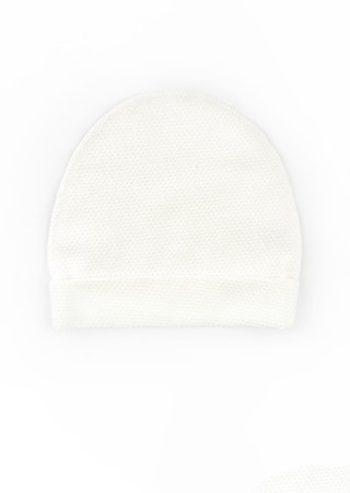 Newborn outfit: cotton gown, footed pants, and hat for the first days