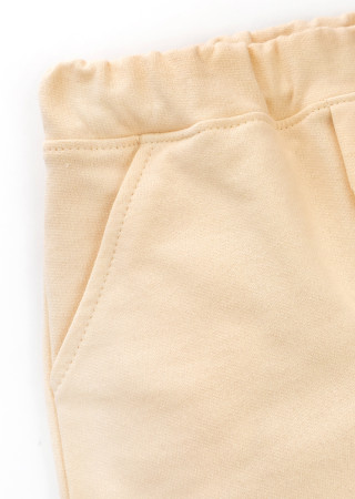 Kremowe spodnie dziecięce z ociepleniem