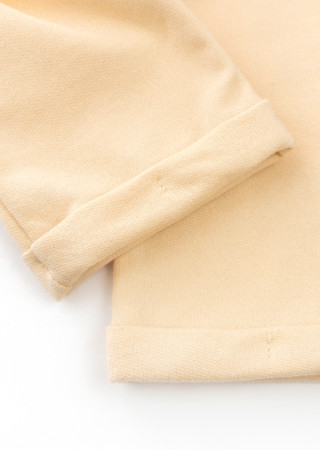 Kremowe spodnie dziecięce z ociepleniem