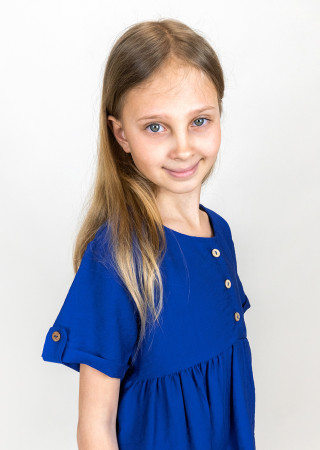 Light children's dress with buttons made of crinkled linen